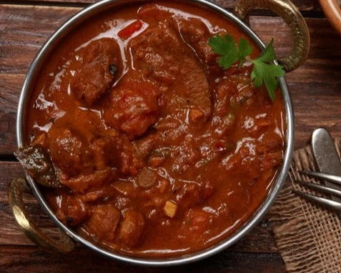 Delicious Chicken Roganjosh dish at BHARAT HALWAI in Edmonton, AB